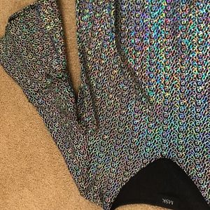 Woman’s sparkly dress top with flared sleeves